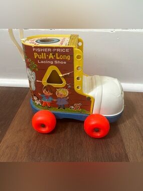 1970 Fisher-Price Red, Yellow and Blue Pull-A-Long Lacing Shoe